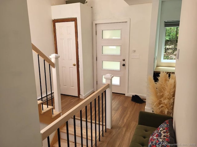 44 Tolland Ave Apt 54, Stafford, CT 06076 - foyer entrance with wood finished floors and baseboards