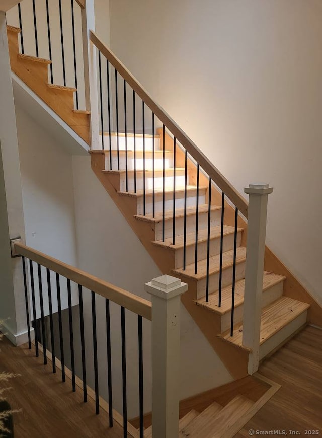 44 Tolland Ave Apt 54, Stafford, CT 06076 - staircase featuring wood finished floors