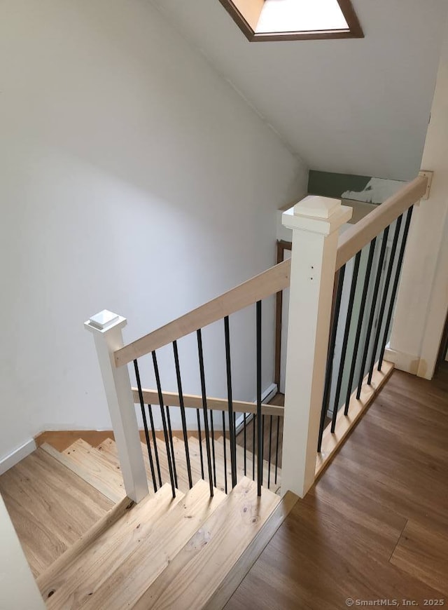 44 Tolland Ave Apt 54, Stafford, CT 06076 - stairs featuring wood finished floors and baseboards