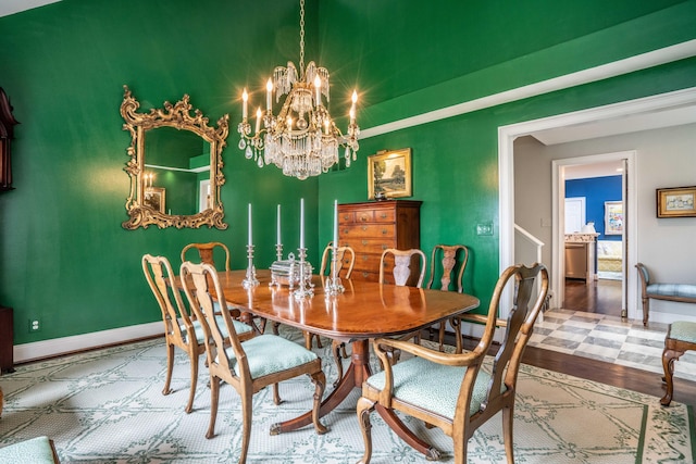 35 Saddle Rdg Unit 35, Bloomfield, CT 06002 - dining room featuring a chandelier, baseboards, and wood finished floors