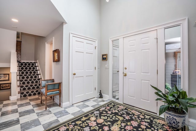 35 Saddle Rdg Unit 35, Bloomfield, CT 06002 - entryway featuring light floors, stairs, and baseboards
