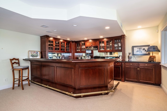 35 Saddle Rdg Unit 35, Bloomfield, CT 06002 - bar with light carpet, under cabinet range hood, baseboards, and recessed lighting