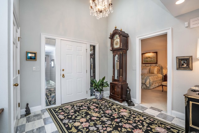 35 Saddle Rdg Unit 35, Bloomfield, CT 06002 - foyer with a high ceiling, baseboards, and a chandelier