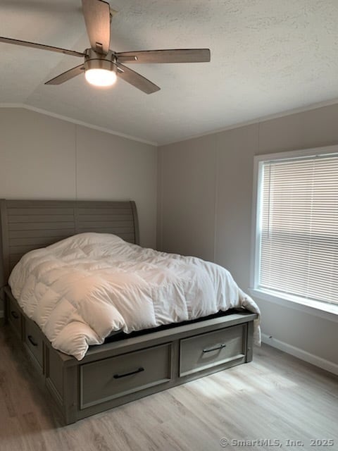 1012 Old Colony Rd Lot 8, Meriden, CT 06451 - bedroom with light wood-type flooring, lofted ceiling, a ceiling fan, and baseboards