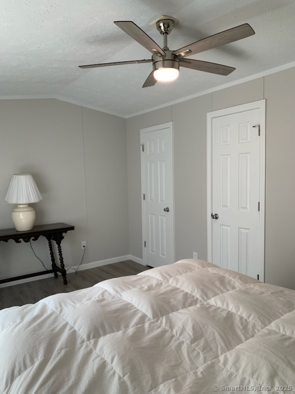 1012 Old Colony Rd Lot 8, Meriden, CT 06451 - bedroom featuring wood finished floors, baseboards, vaulted ceiling, ornamental molding, and a textured ceiling