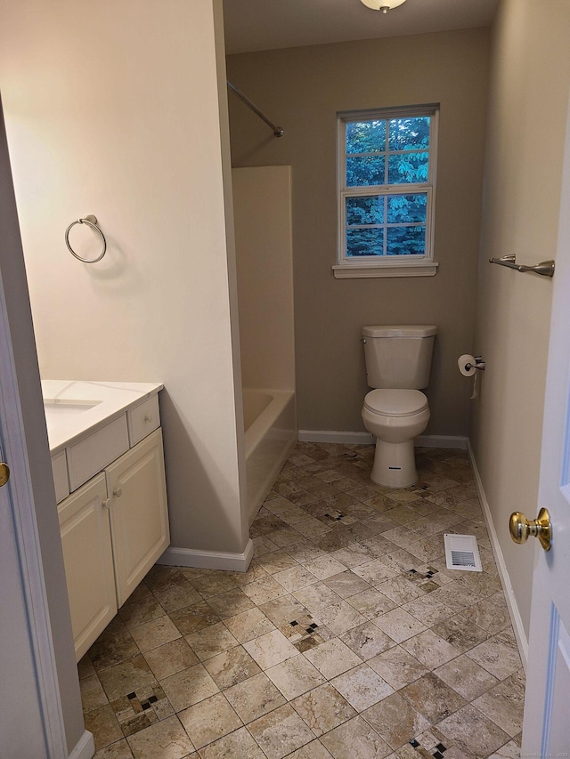 24 Wiscassett Ave, Hamden, CT 06518 - full bath featuring vanity, toilet, baseboards, bathtub / shower combination, and stone finish floors