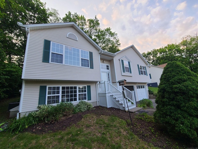 24 Wiscassett Ave, Hamden, CT 06518 - raised ranch featuring a garage
