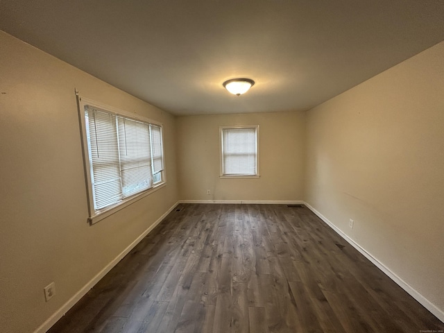 138 Radnor Ave, Naugatuck, CT 06770 - spare room with dark wood finished floors and baseboards