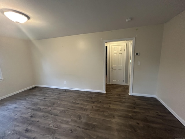 138 Radnor Ave, Naugatuck, CT 06770 - unfurnished room with dark wood finished floors, a smoke detector, and baseboards