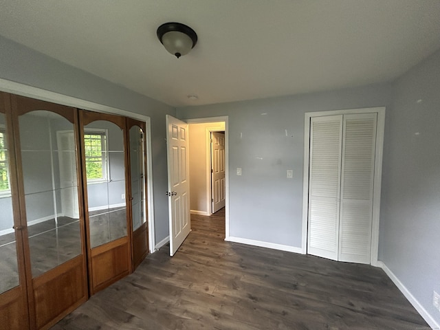 138 Radnor Ave, Naugatuck, CT 06770 - unfurnished bedroom featuring a closet, dark wood finished floors, and baseboards