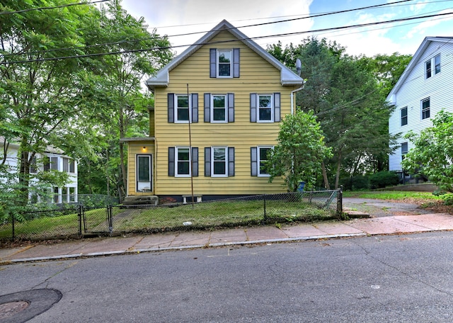 9 Woodland St, Vernon, CT 06066 - traditional-style house with a gate and a fenced front yard
