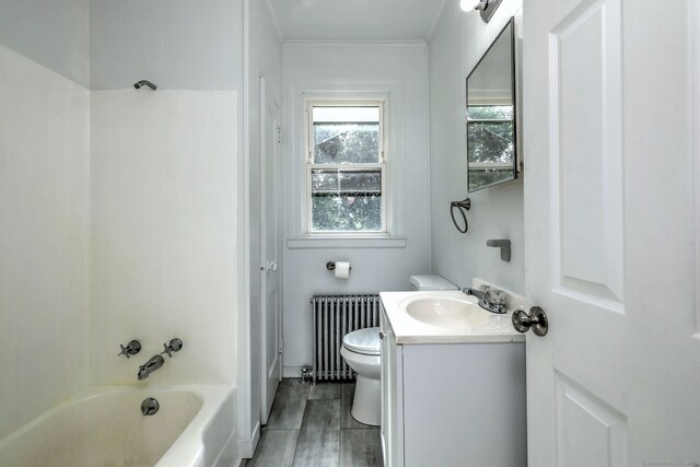 9 Woodland St, Vernon, CT 06066 - full bath featuring radiator heating unit, vanity, shower / bath combination, and ornamental molding