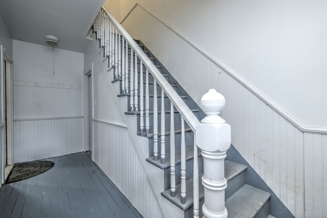 9 Woodland St, Vernon, CT 06066 - staircase featuring wainscoting and hardwood / wood-style floors