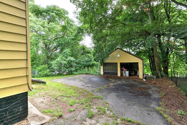 9 Woodland St, Vernon, CT 06066 - view of yard with a detached garage and an outdoor structure