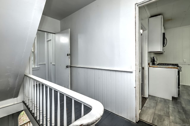 9 Woodland St, Vernon, CT 06066 - hall with wood walls and a wainscoted wall