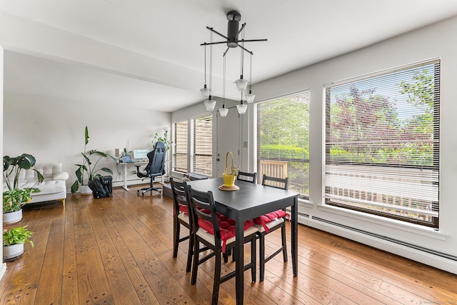 3 Clemens Ct Unit 3, Rocky Hill, CT 06067 - dining area with baseboard heating and hardwood / wood-style floors