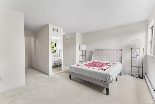 3 Clemens Ct Unit 3, Rocky Hill, CT 06067 - bedroom with carpet, a baseboard heating unit, baseboards, and a closet