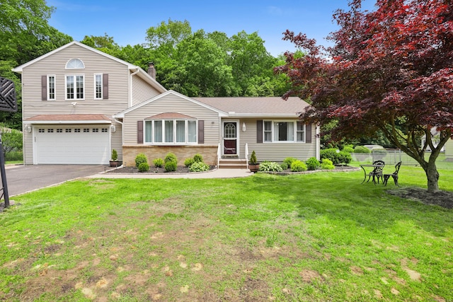8 Palmer Ln, Oxford, CT 06478 - view of front facade featuring a chimney, a garage, asphalt driveway, and brick siding
