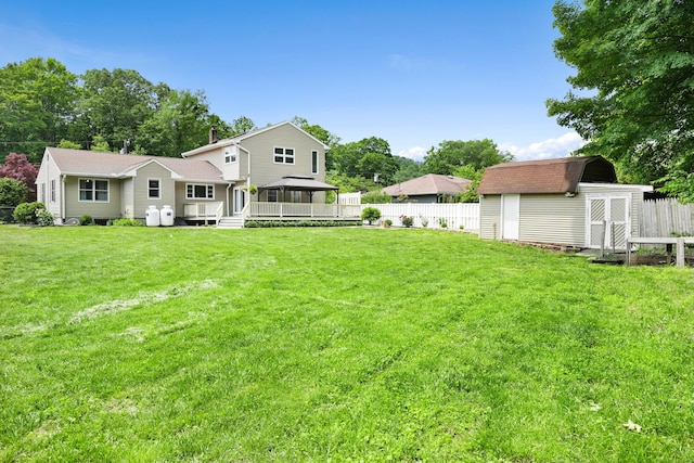 8 Palmer Ln, Oxford, CT 06478 - rear view of property featuring a shed, a gazebo, a shingled roof, and a wooden deck