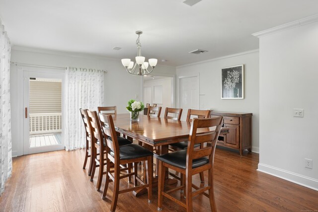 8 Palmer Ln, Oxford, CT 06478 - dining space with a chandelier, wood finished floors, and ornamental molding