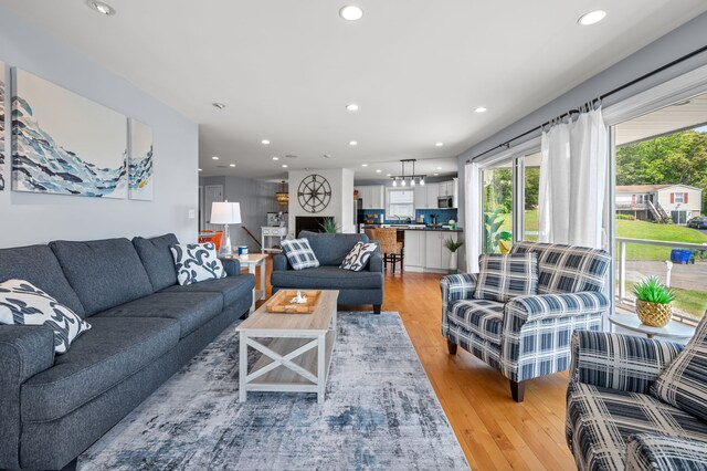 49 Economy Dr, Westbrook, CT 06498 - living room featuring light wood-type flooring and recessed lighting