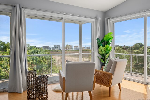 49 Economy Dr, Westbrook, CT 06498 - dining space with wood finished floors and a water view