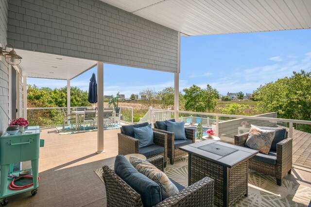 49 Economy Dr, Westbrook, CT 06498 - view of patio with an outdoor living space, outdoor dining area, and a wooden deck