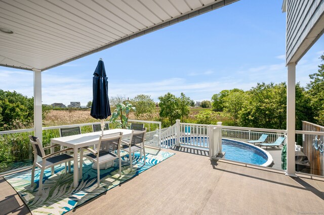 49 Economy Dr, Westbrook, CT 06498 - view of patio with an outdoor pool and outdoor dining area