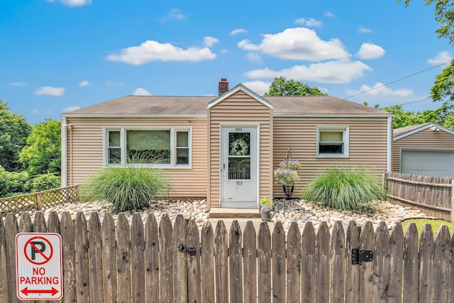 103 Mount Pleasant St, Derby, CT 06418 - view of front facade with a chimney and roof with shingles
