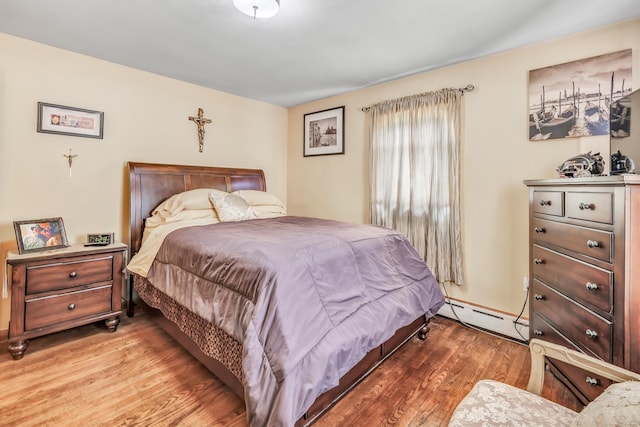 103 Mount Pleasant St, Derby, CT 06418 - bedroom featuring baseboard heating and wood finished floors