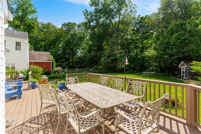 17 Joanne Ln, Weston, CT 06883 - deck featuring outdoor dining area, a yard, and view of wooded area