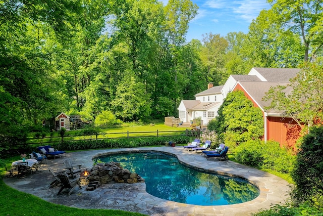 17 Joanne Ln, Weston, CT 06883 - view of pool with a patio area and an outdoor fire pit