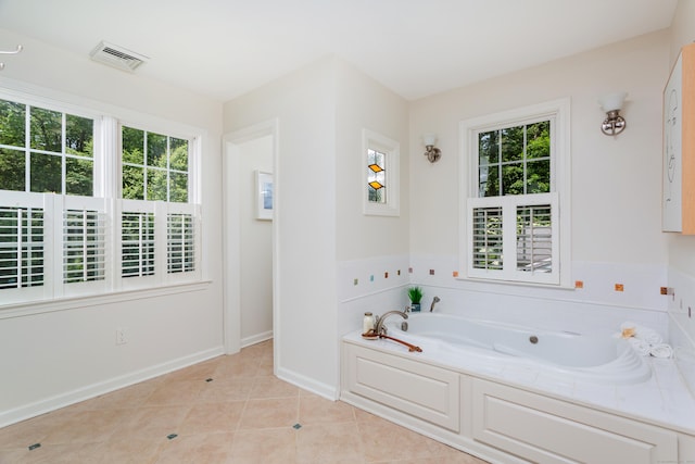 17 Joanne Ln, Weston, CT 06883 - full bathroom featuring a garden tub, tile patterned flooring, and baseboards