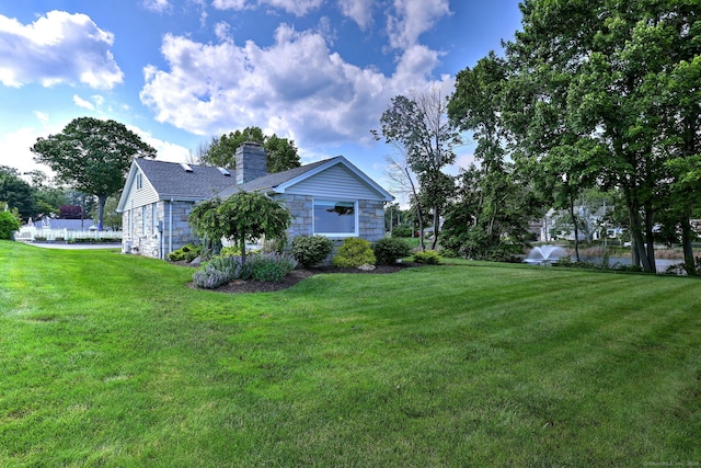 660 Ocean Ave, West Haven, CT 06516 - view of property exterior featuring stone siding, a chimney, and a yard