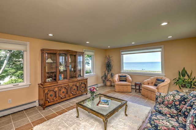 660 Ocean Ave, West Haven, CT 06516 - tiled living room featuring a baseboard radiator and recessed lighting