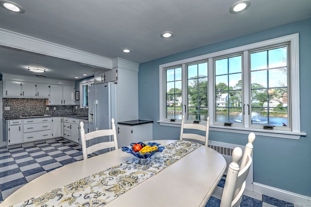 660 Ocean Ave, West Haven, CT 06516 - dining area featuring recessed lighting and a water view