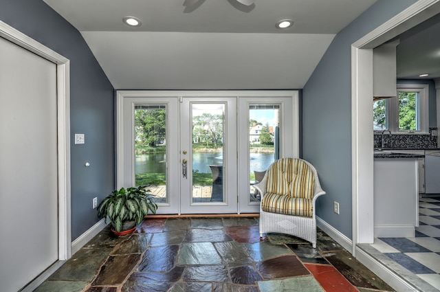 660 Ocean Ave, West Haven, CT 06516 - sitting room featuring lofted ceiling, a water view, recessed lighting, and stone finish floors