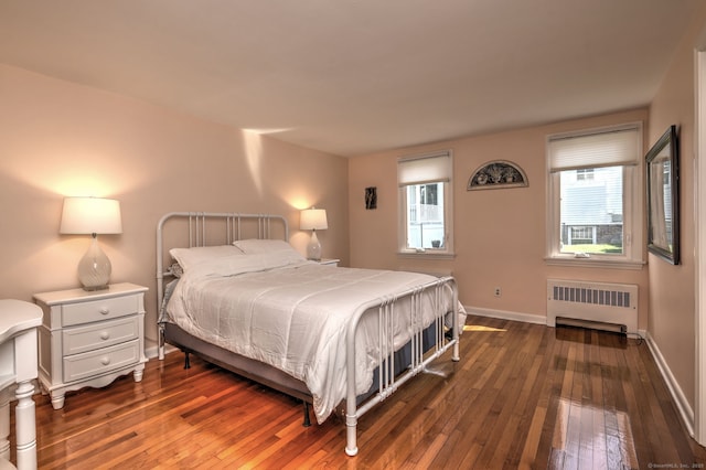 660 Ocean Ave, West Haven, CT 06516 - bedroom featuring radiator heating unit, hardwood / wood-style floors, and multiple windows
