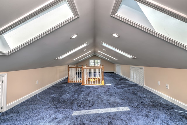 660 Ocean Ave, West Haven, CT 06516 - additional living space with a skylight, vaulted ceiling, carpet, and recessed lighting