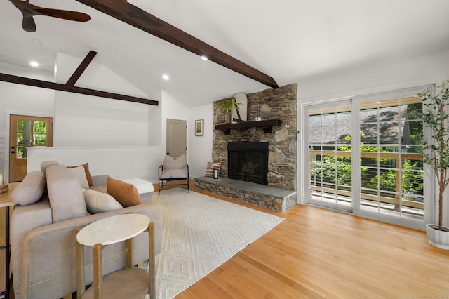 15 Fedus Dr, East Haddam, CT 06415 - living area with beamed ceiling, a stone fireplace, wood finished floors, ceiling fan, and recessed lighting