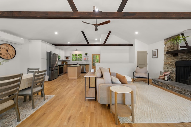 15 Fedus Dr, East Haddam, CT 06415 - living area featuring an AC wall unit, light wood-style floors, a fireplace, recessed lighting, and ceiling fan