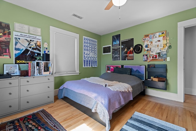 1748 Whitney Ave, Hamden, CT 06517 - bedroom with wood finished floors, baseboards, and ceiling fan