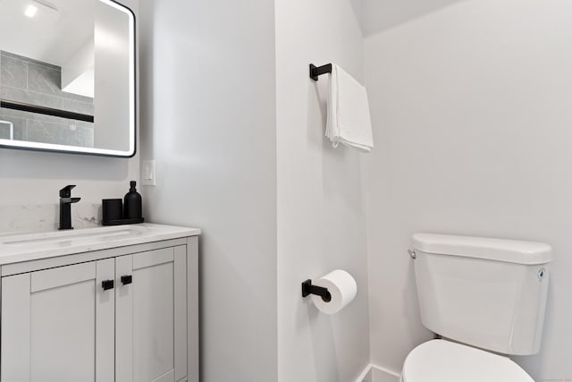 156 Apache Ln Unit A, Stratford, CT 06614 - bathroom featuring toilet, vanity, and a shower