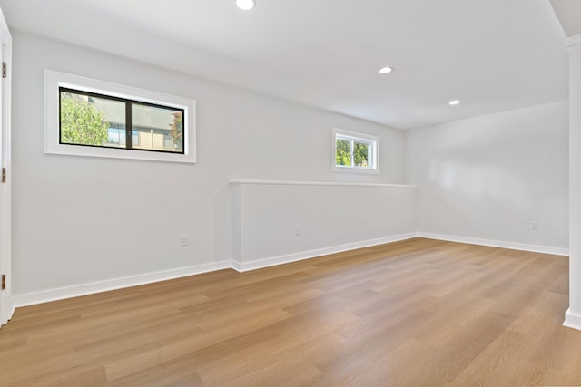 156 Apache Ln Unit A, Stratford, CT 06614 - unfurnished room with light wood-type flooring, baseboards, and recessed lighting