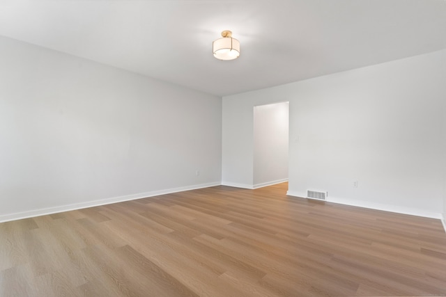 156 Apache Ln Unit A, Stratford, CT 06614 - spare room with light wood-style floors and baseboards