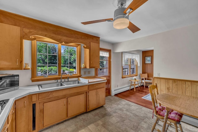 566 Beach Pond Rd, Voluntown, CT 06384 - kitchen featuring a baseboard radiator, light countertops, and a ceiling fan