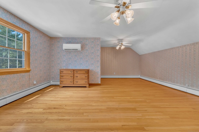 566 Beach Pond Rd, Voluntown, CT 06384 - bonus room with a wall unit AC, wood finished floors, wallpapered walls, ceiling fan, and lofted ceiling