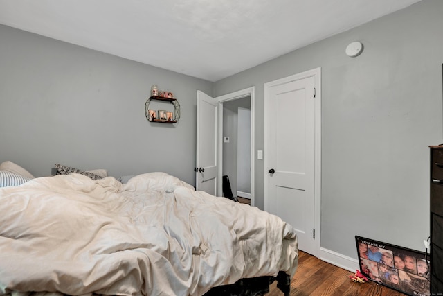 22 Hillside Ave, Torrington, CT 06790 - bedroom with dark wood finished floors and baseboards