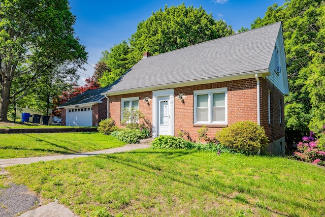 22 Hillside Ave, Torrington, CT 06790 - new england style home with roof with shingles, an attached garage, and brick siding