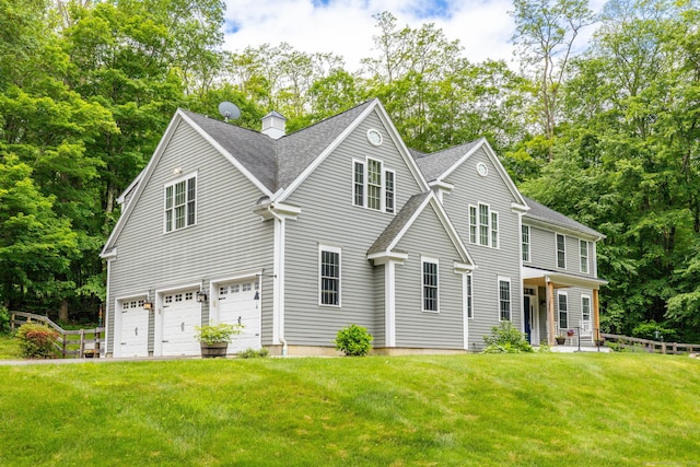 133 Hoop Pole Hill Rd, Woodbury, CT 06798 - view of front of property featuring a garage, a shingled roof, a front lawn, view of wooded area, and a chimney